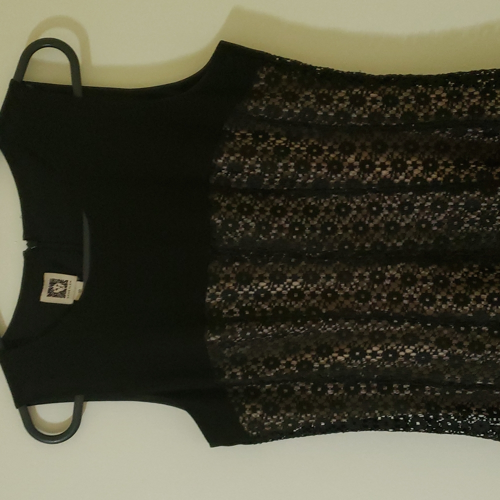 Black crepe and lace dress.